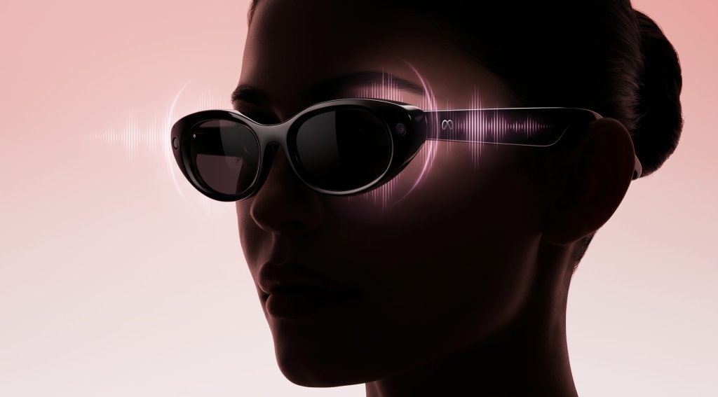 Kylie Jenner AI glasses: black cat-eye Meta smart glasses with a glowing voice waveform, shown in profile