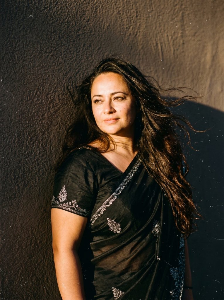 Get the moody black 90s Bollywood vintage saree