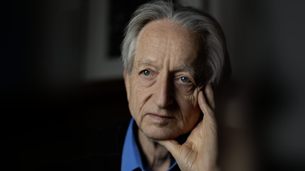geoffrey hinton ai labor impact: AI pioneer Geoffrey Hinton photographed in 2026, resting his hand against his face