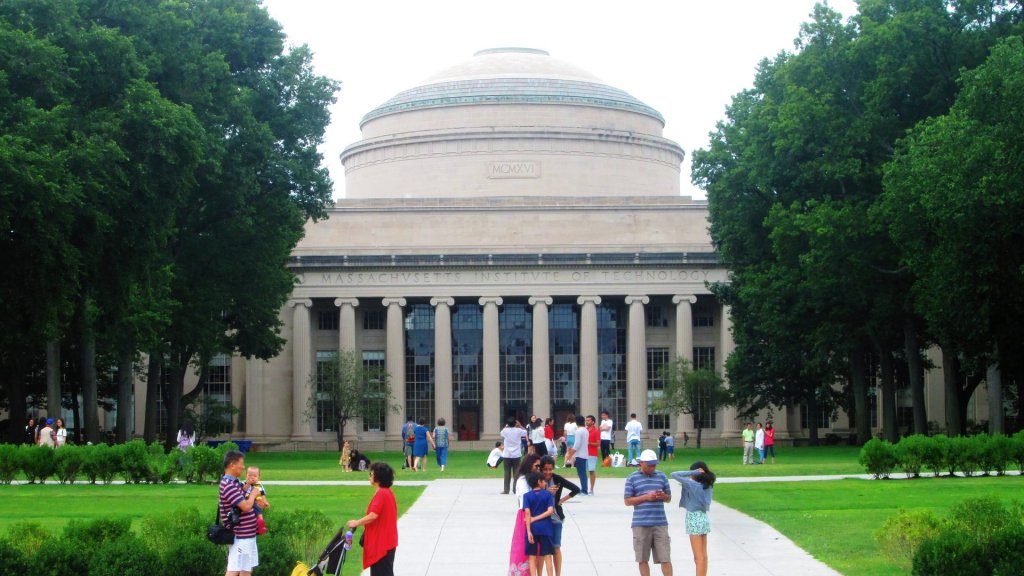 MIT AI undergraduate assignments report: the Great Dome and columns of MIT Building 10 seen across Killian Court