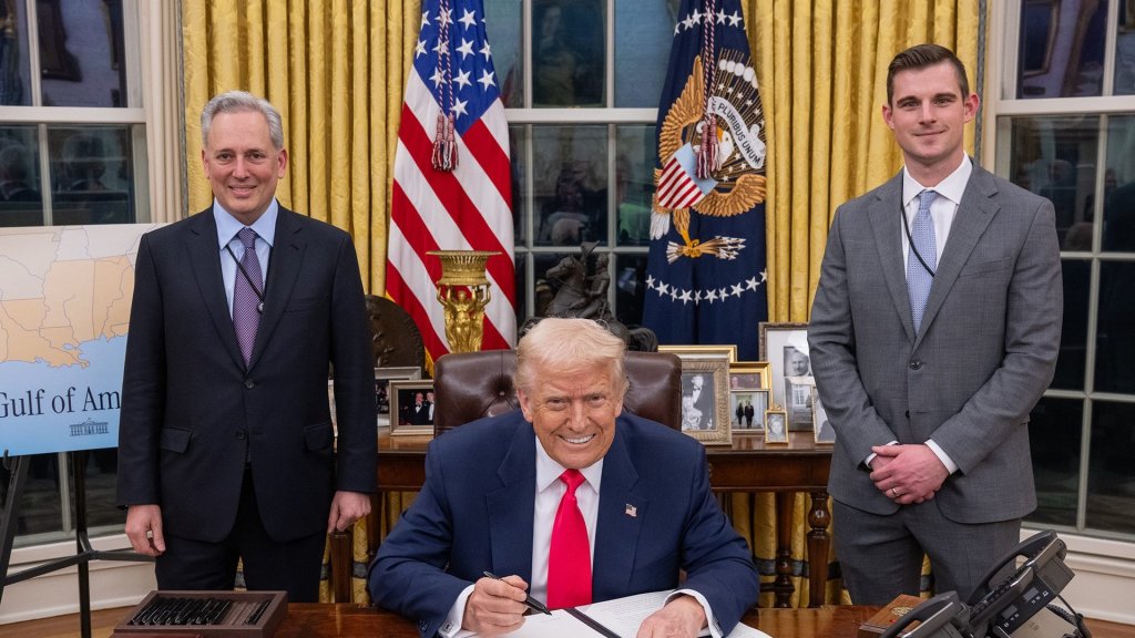 Trump AI Force: President Donald Trump signing at the Resolute Desk with then AI and crypto czar David Sacks standing beside him
