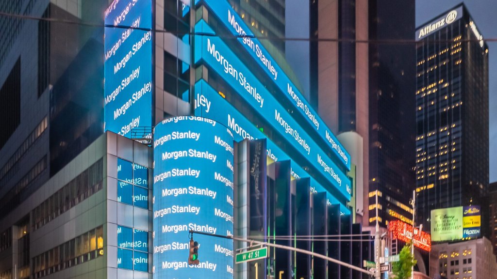 autonomous ai agents banking risks: Morgan Stanley headquarters in Times Square, New York, lit up at dusk