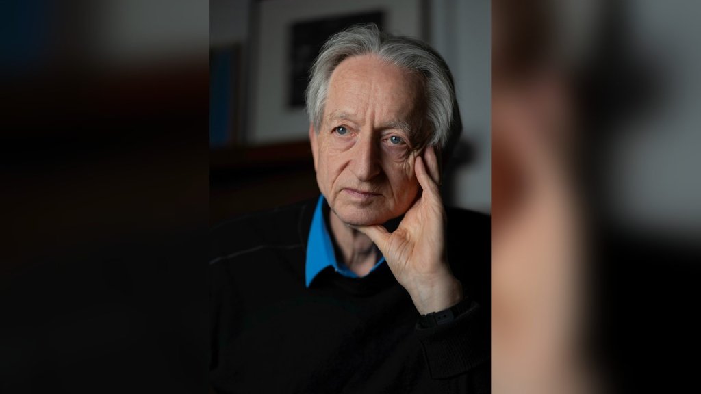 Geoffrey Hinton AI consciousness: Hinton in a 2026 portrait, resting his head on his hand