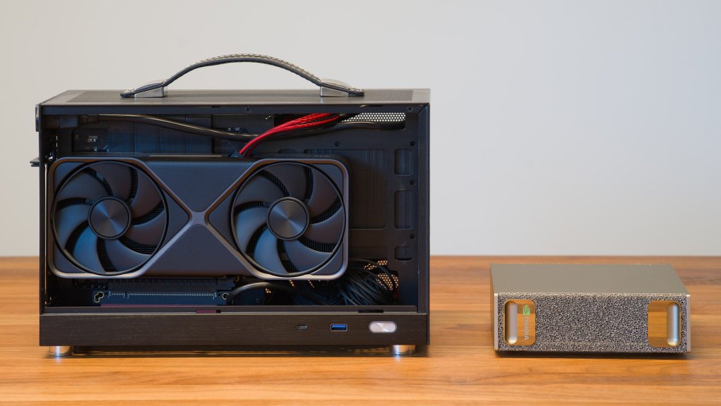 Ghost computer AI rivals: a small form factor PC with an Nvidia RTX card next to an Nvidia DGX Spark on a wooden desk