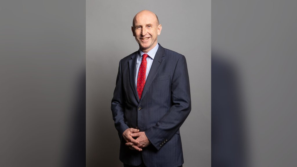 John Healey inheritance tax AI proposal: official portrait of Chancellor John Healey in a navy suit and red tie