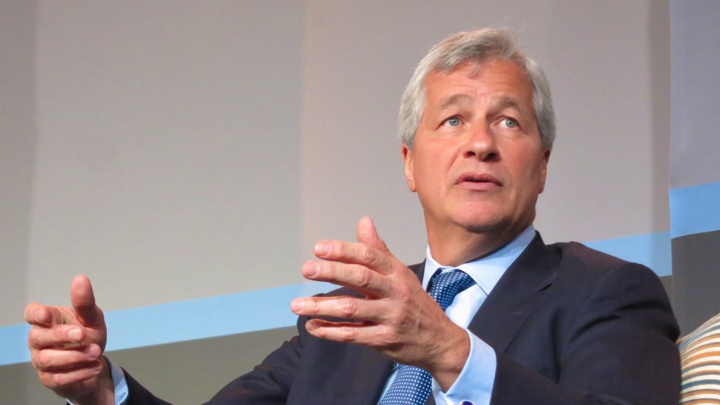 jpmorgan external ai agents blocked: JPMorgan Chase CEO Jamie Dimon gesturing while speaking on stage