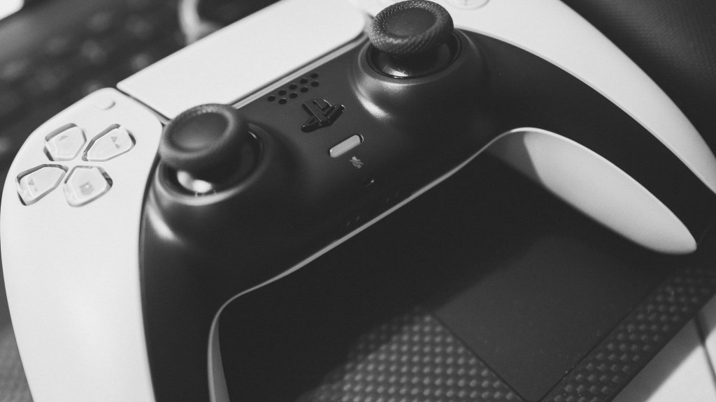 playstation ai enemy behavior patent: close-up of a PlayStation 5 DualSense controller